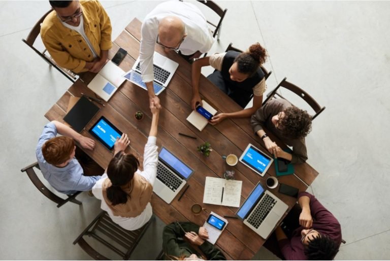 Deal team collaborating during a business sale